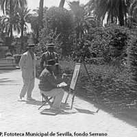 El príncipe abisinio Shervoingthon, acompañado por el artista Juan Lafita, observando a un pintor en los jardines del Real Alcázar. 1924 ©ICAS-SAHP, Fototeca Municipal de Sevilla, fondo Serrano